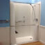 Caregiver Showering System Includes Telescopic/Pivoting Rod and Curtain (66" W x 33" H)